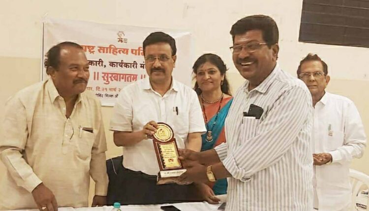 Prakash Holkar as a member of ABM Sahitya Mahamandal