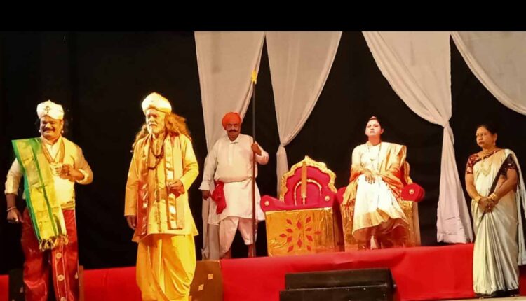 Maharashtra State Drama Competition/The victory of royal power over religious power.?" Dharmamaya